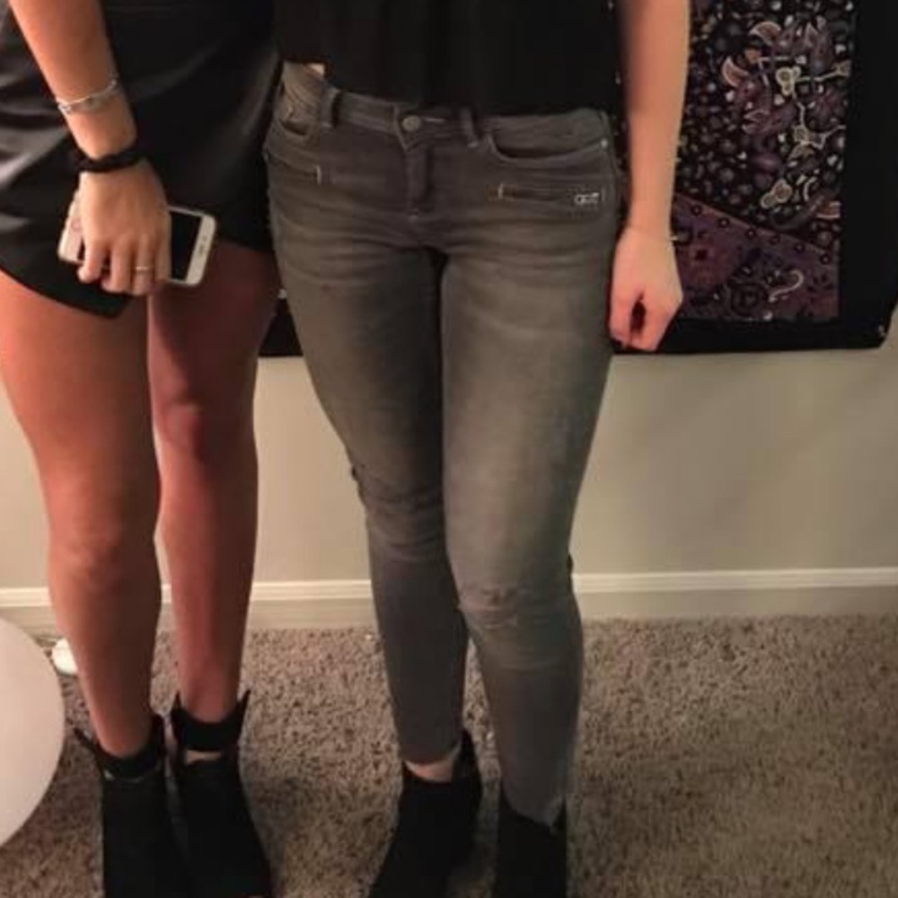 Grey distressed jeans